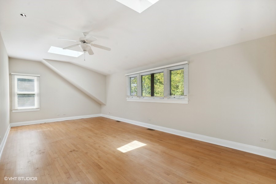 1282 Edgewood Road Lake Forest, IL 60045 - Photo 15 of 27 wooden floor in an empty room with a window