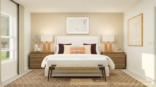 a bedroom with a bed and a window