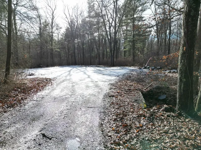 a view of a backyard of the house