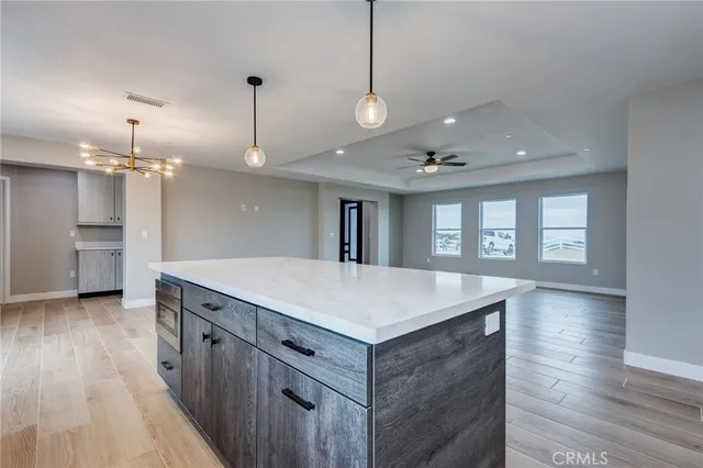 a view of kitchen and windows