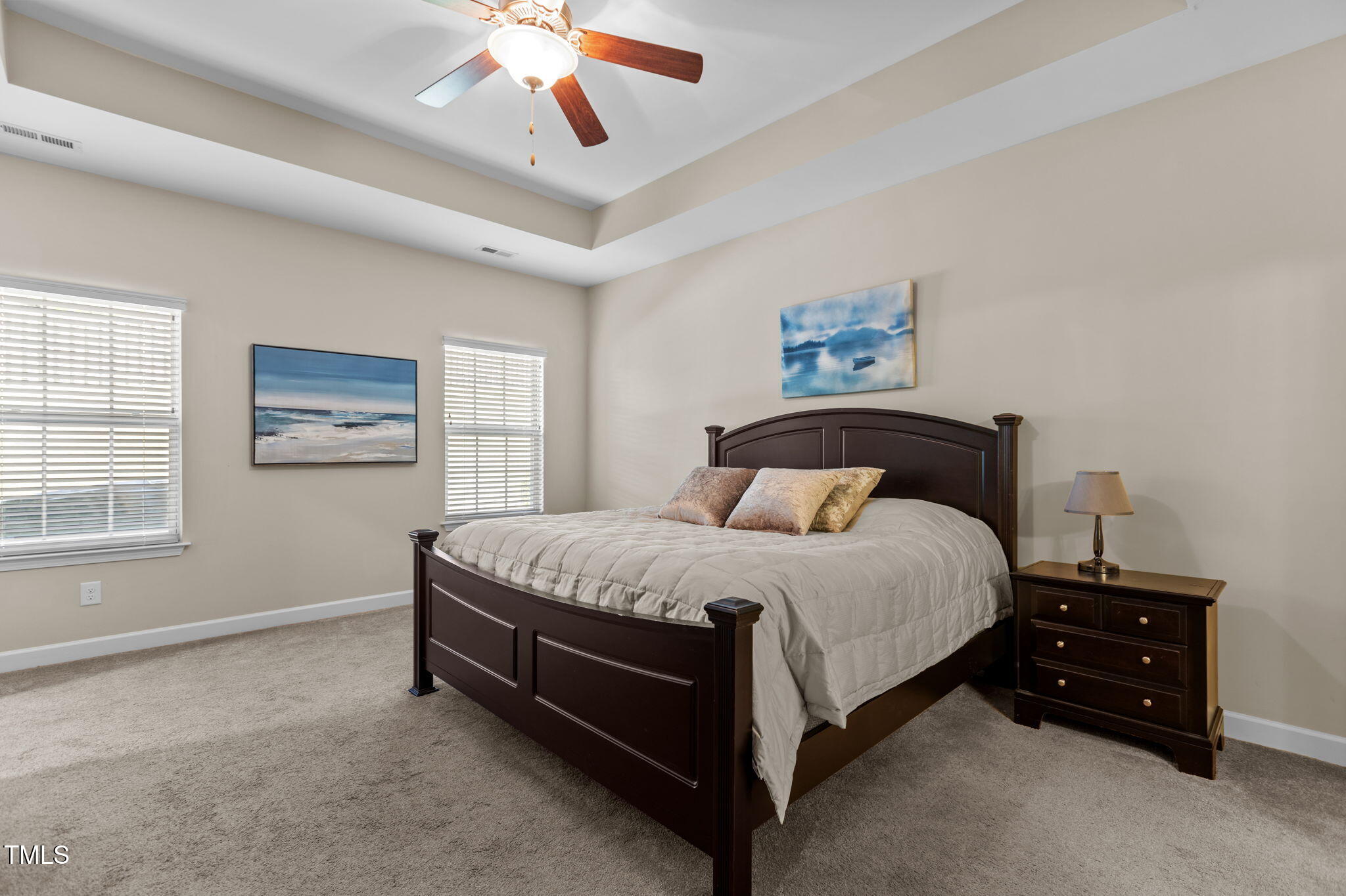 3412 South Beaver Lane Raleigh, NC 27604 - Photo 13 of 30 a spacious bedroom with a bed and a window