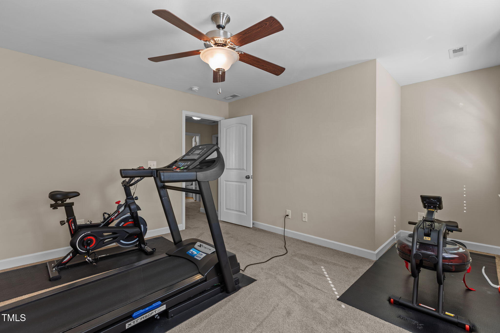 3412 South Beaver Lane Raleigh, NC 27604 - Photo 17 of 30 a room with gym equipment