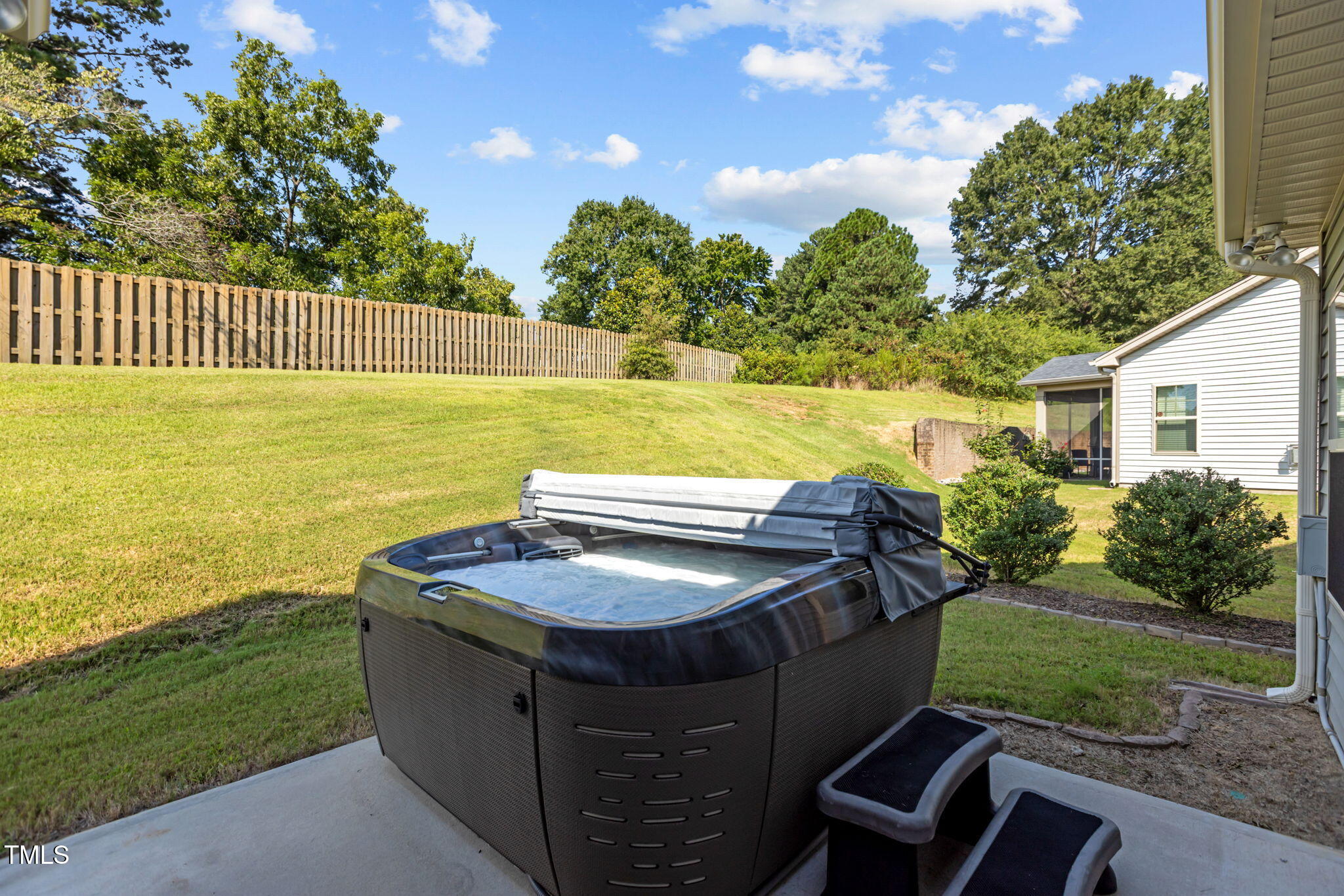 3412 South Beaver Lane Raleigh, NC 27604 - Photo 24 of 30 a view of a swimming pool with a patio and garden
