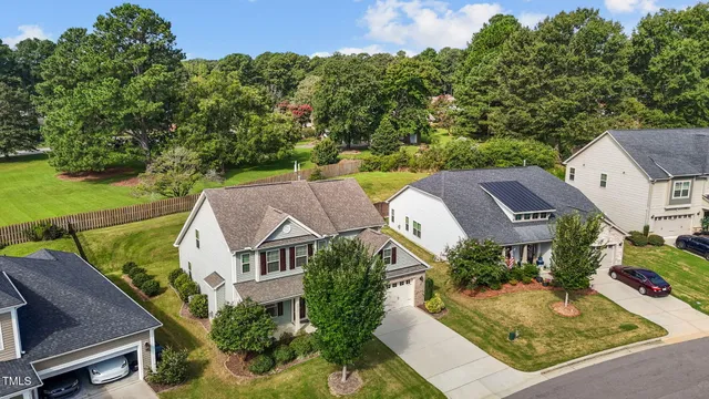 an aerial view of a house with a garden