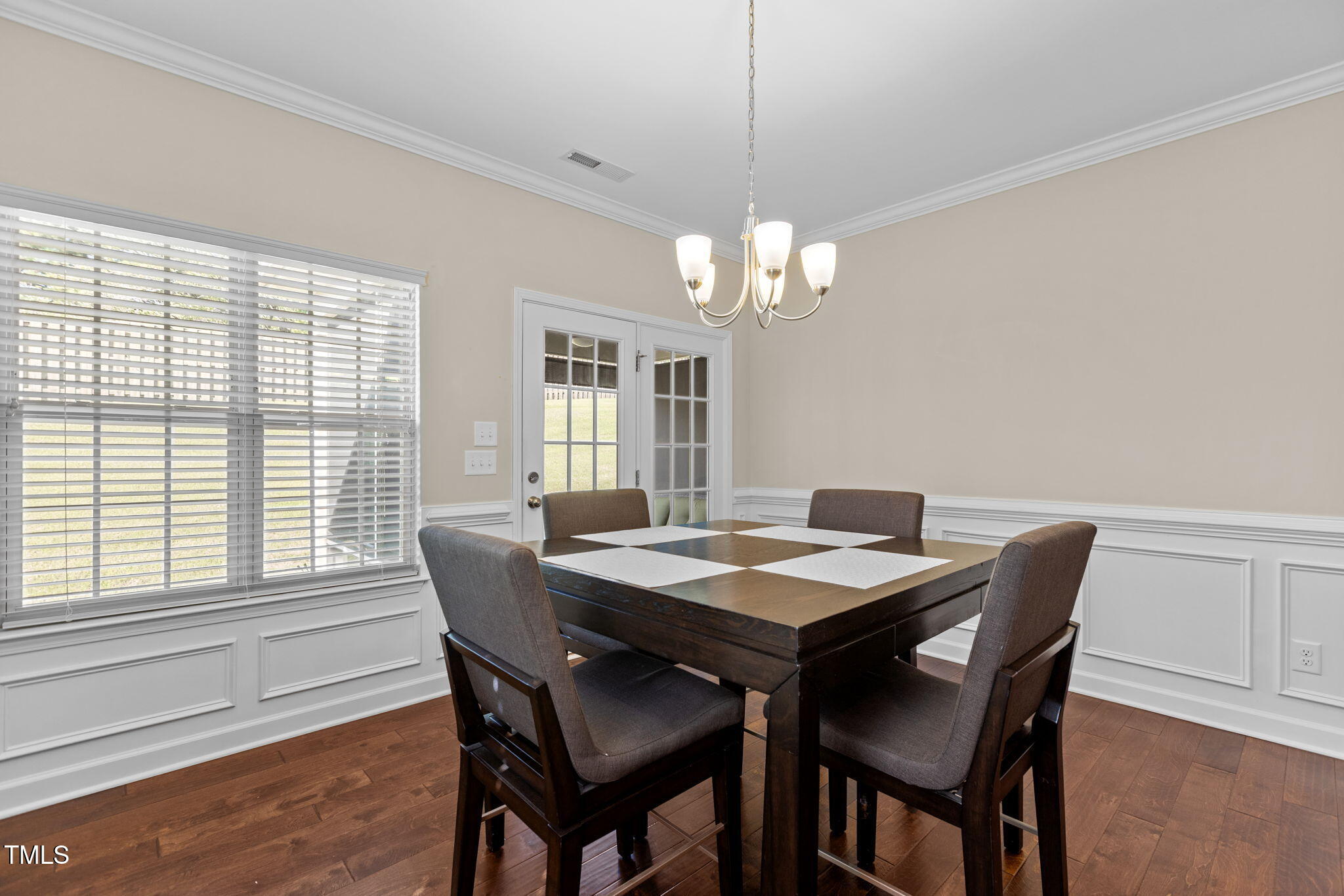 3412 South Beaver Lane Raleigh, NC 27604 - Photo 6 of 30 a view of a dining room with furniture window and outside view