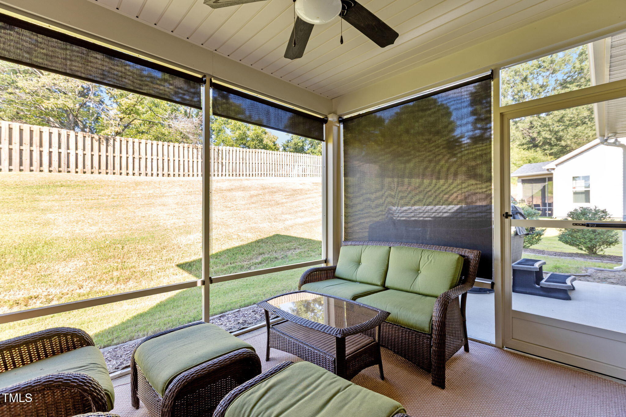 3412 South Beaver Lane Raleigh, NC 27604 - Photo 10 of 30 a living room with furniture and a floor to ceiling window