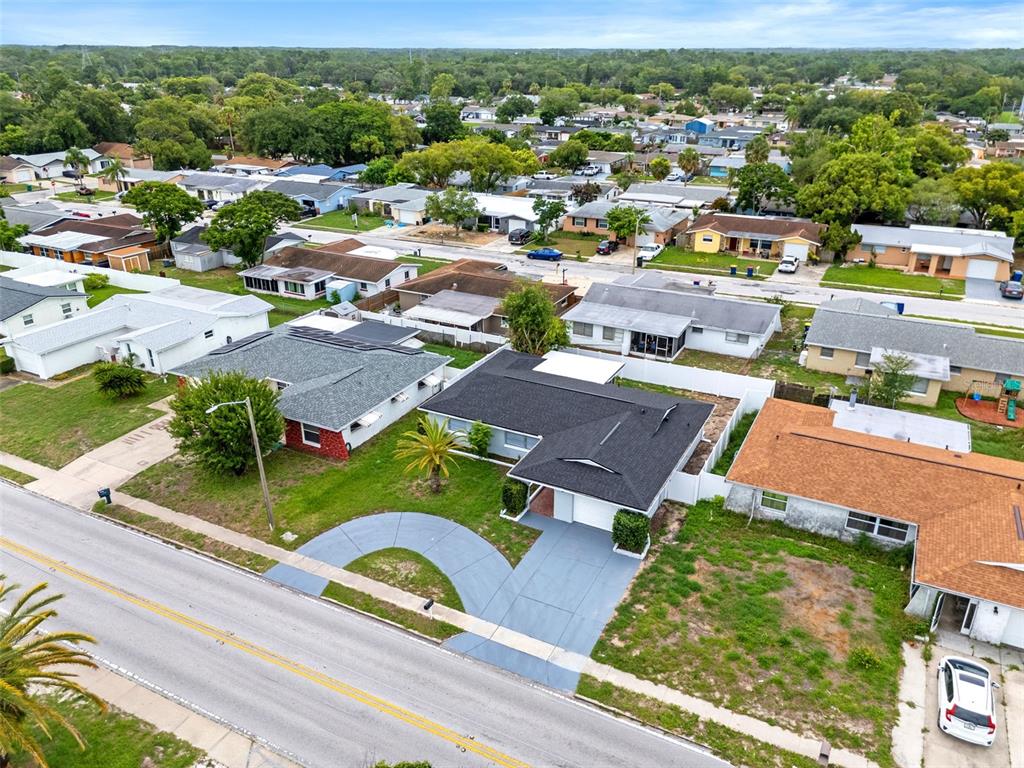 5626 Moog Road Holiday, FL 34690 - Photo 34 of 38 an aerial view of a house with a garden