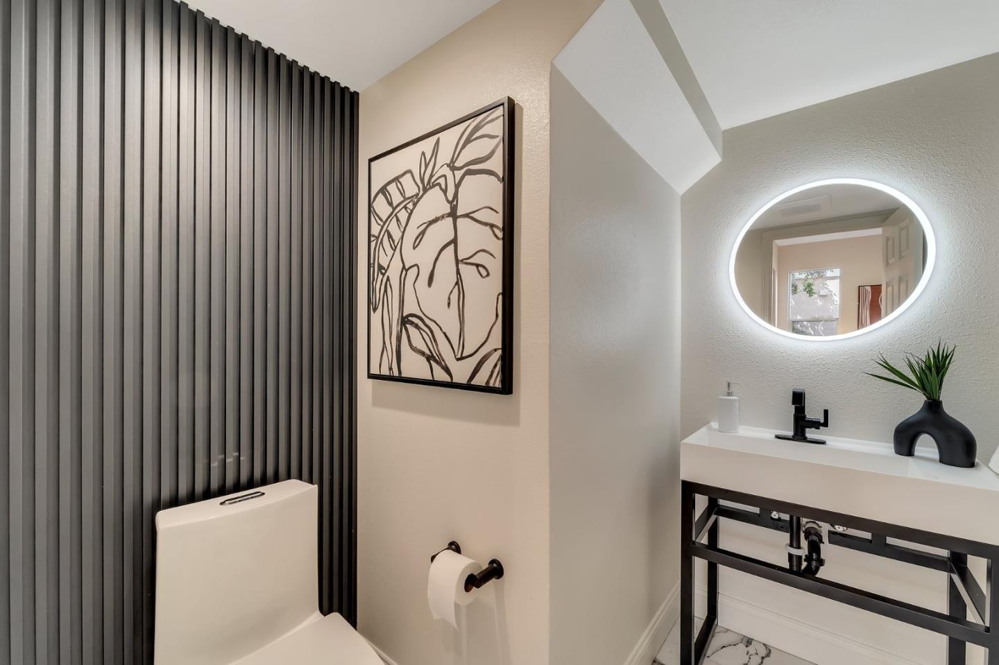 545 Minton Lane Mountain View, CA 94041 - Photo 13 of 31 a bathroom with a toilet sink and mirror