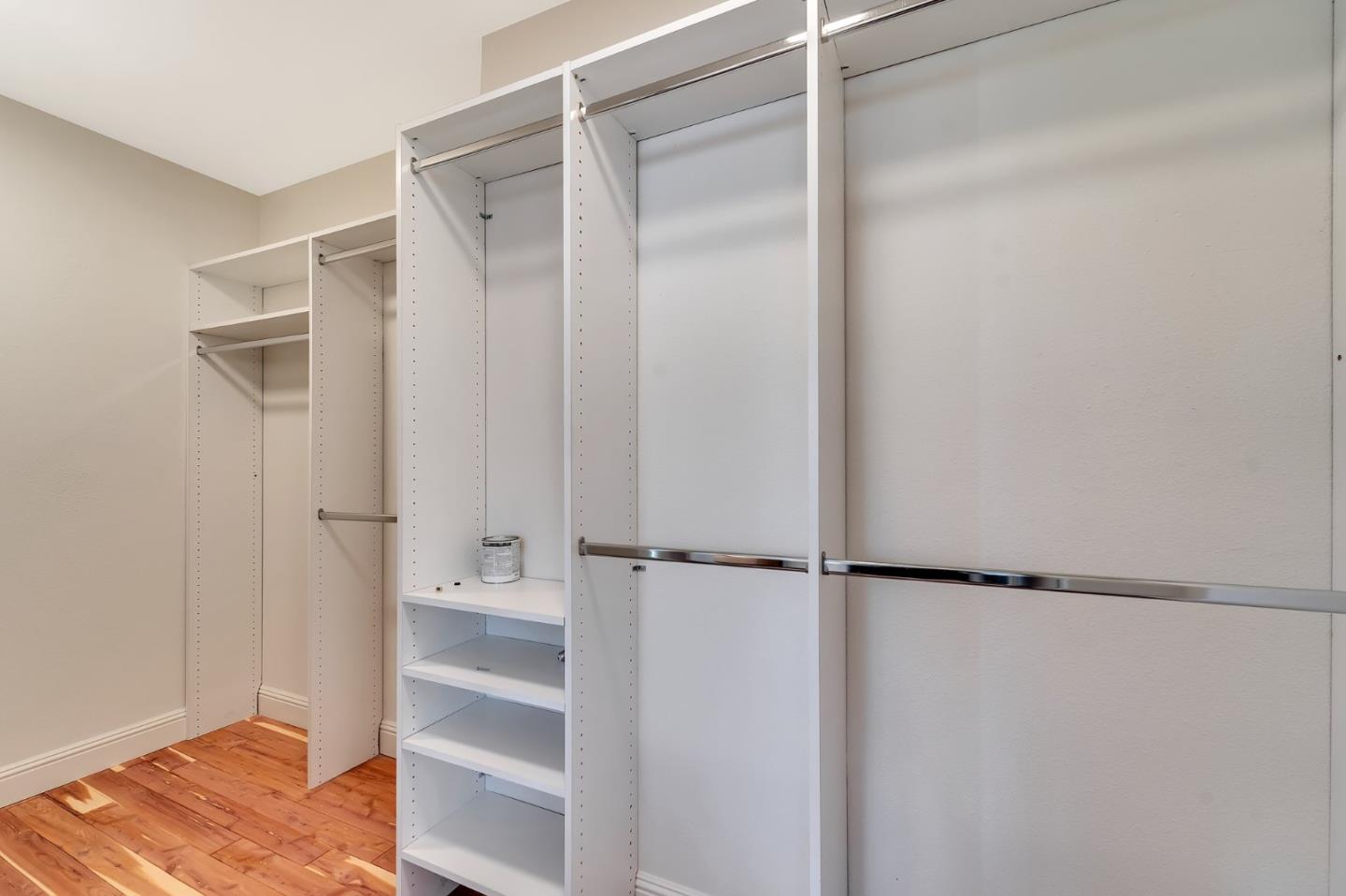 545 Minton Lane Mountain View, CA 94041 - Photo 16 of 31 a view of walk in closet with empty racks
