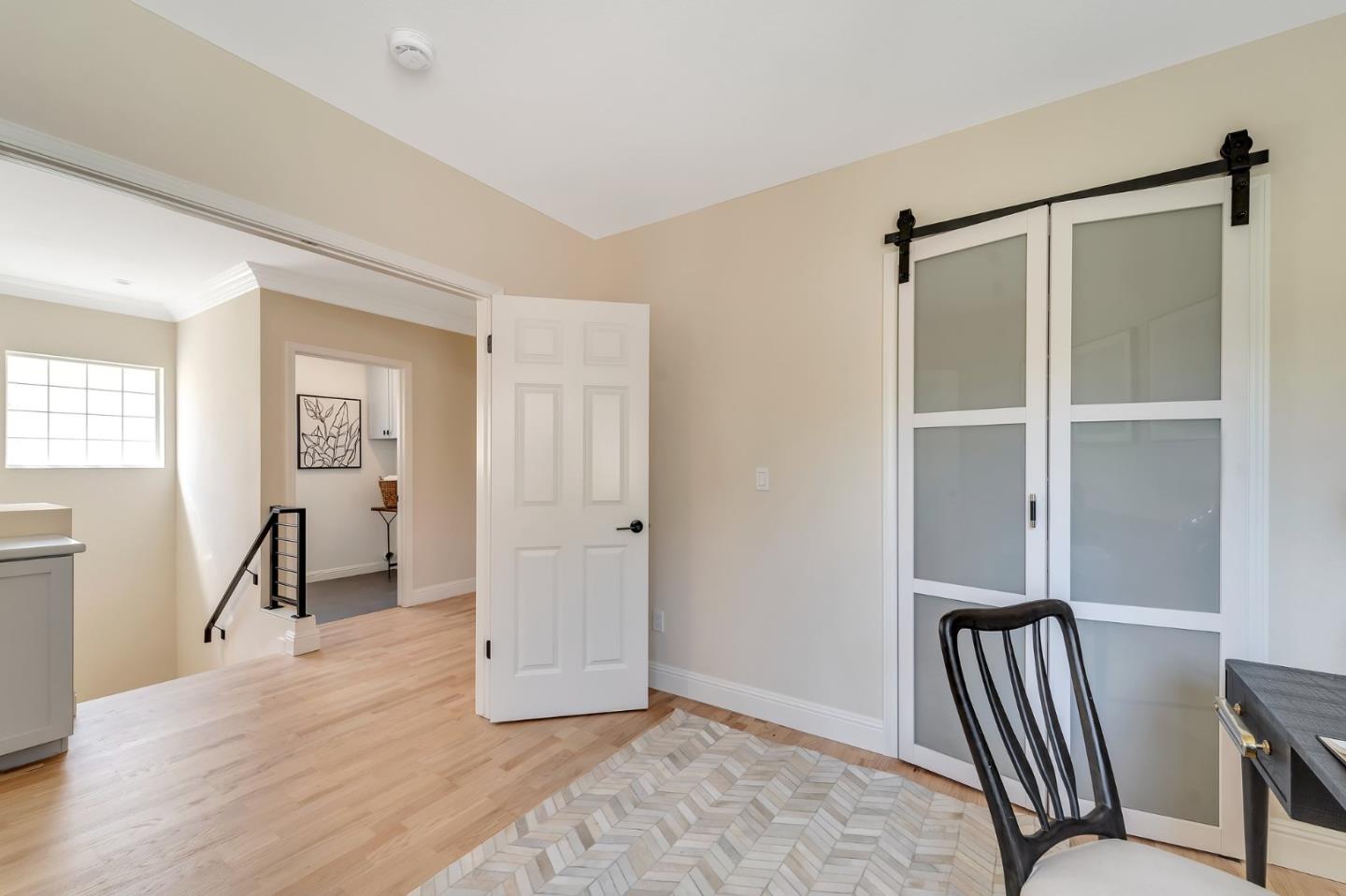545 Minton Lane Mountain View, CA 94041 - Photo 20 of 31 a view of room with window and wooden floor