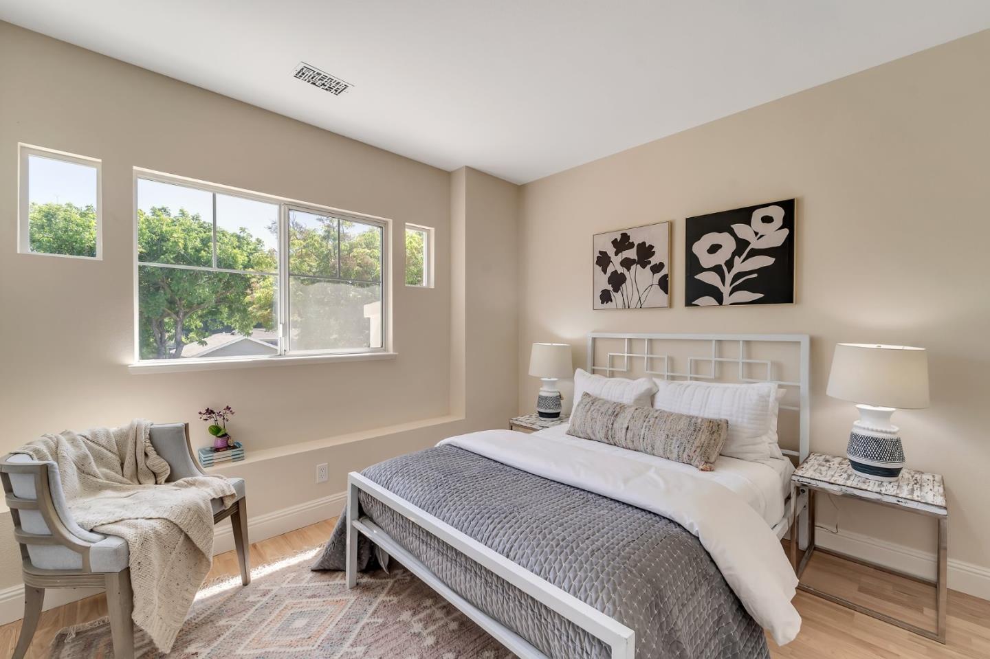 545 Minton Lane Mountain View, CA 94041 - Photo 21 of 31 a bedroom with a large bed and a window