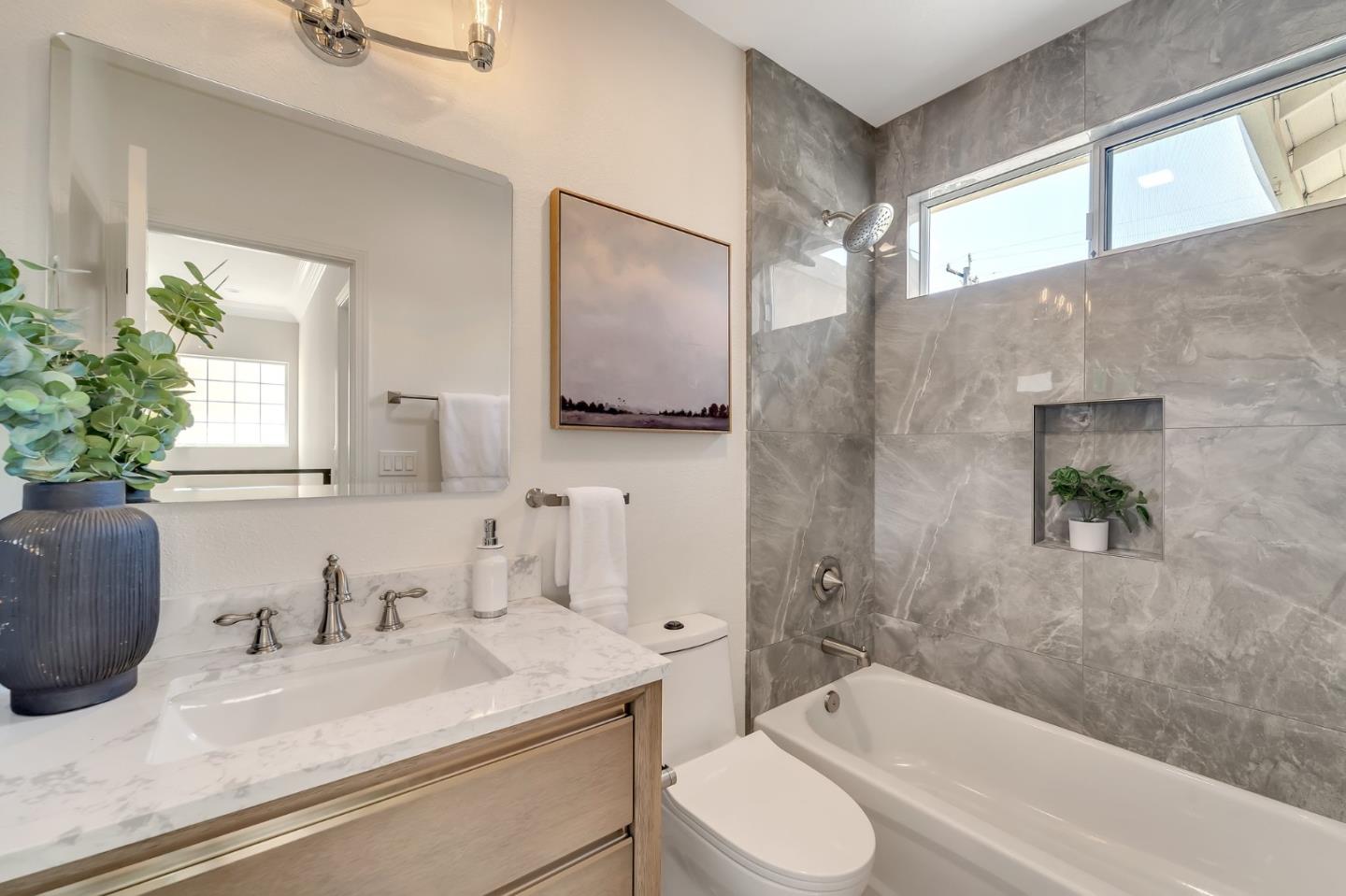 545 Minton Lane Mountain View, CA 94041 - Photo 22 of 31 a bathroom with a granite countertop sink toilet and shower