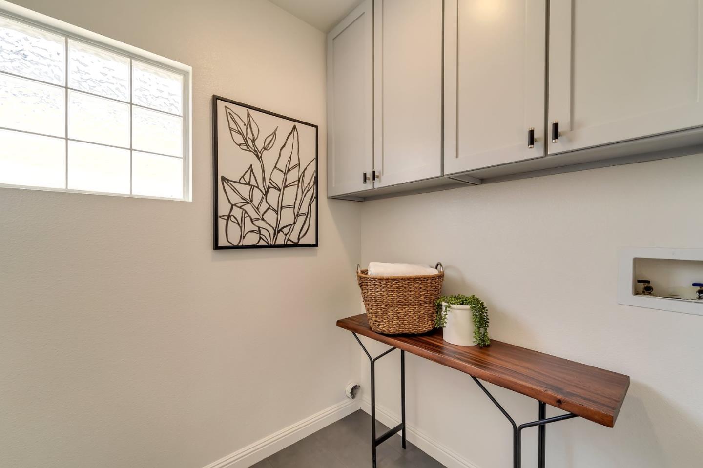 545 Minton Lane Mountain View, CA 94041 - Photo 23 of 31 a view of cabinets and wooden floor with a sink