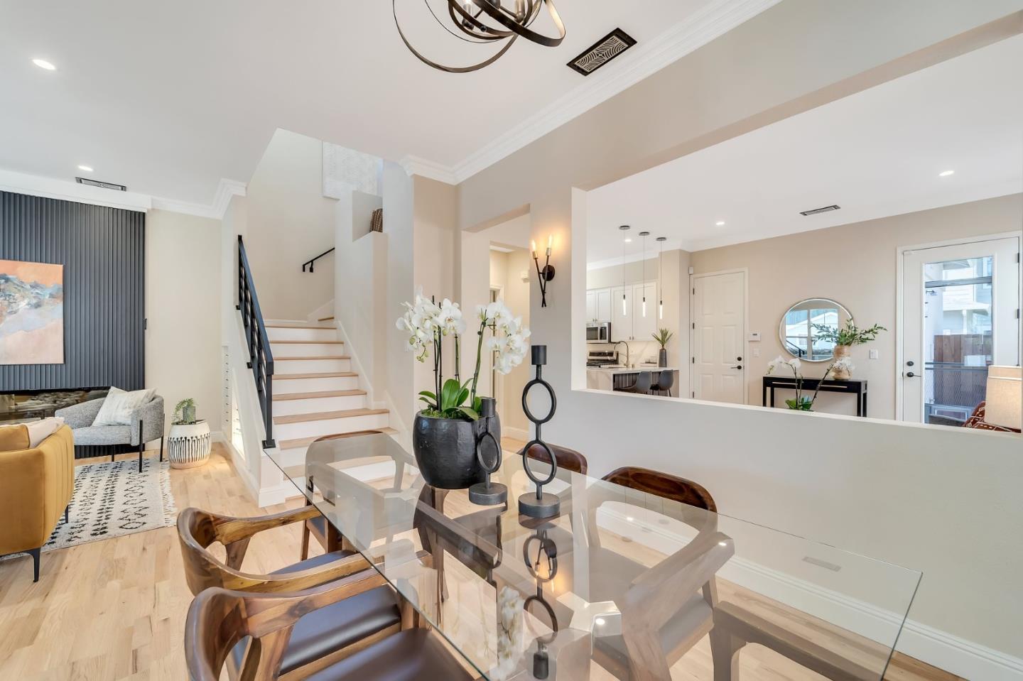 545 Minton Lane Mountain View, CA 94041 - Photo 8 of 31 a living room with furniture a rug and white walls