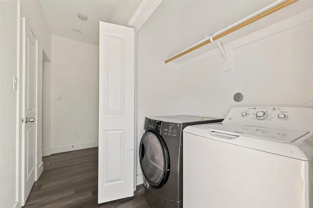 a utility room with dryer and washer