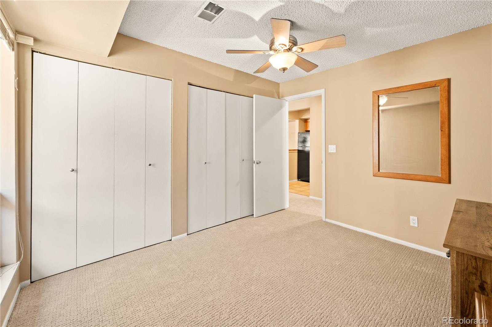 1890 Argentine Street, Unit 303 Georgetown, CO 80444 - Photo 11 of 22 a view of an empty room with a chandelier fan