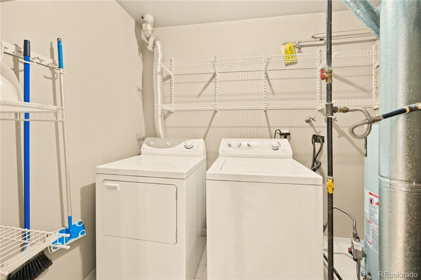 1890 Argentine Street, Unit 303 Georgetown, CO 80444 - Photo 12 of 22 a utility room with dryer and washer
