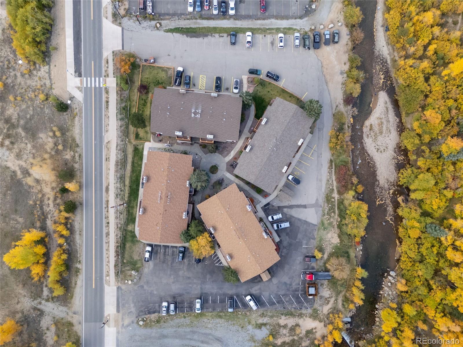 1890 Argentine Street, Unit 303 Georgetown, CO 80444 - Photo 22 of 22 an aerial view of residential houses with outdoor space