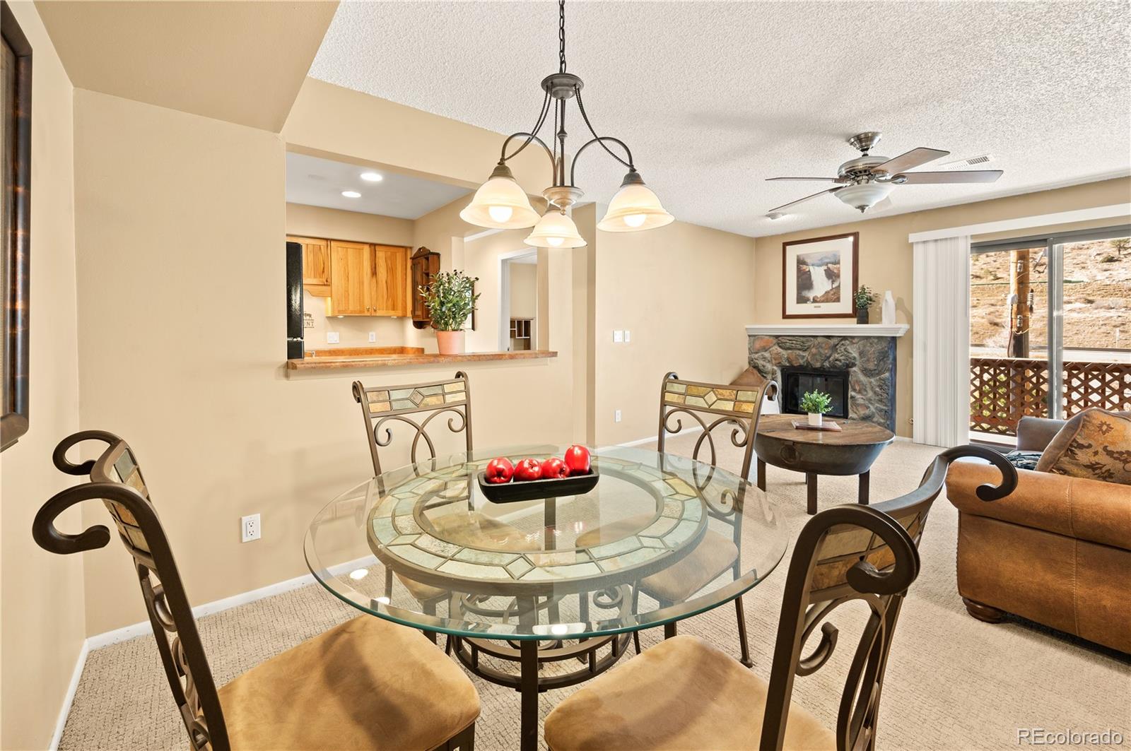 1890 Argentine Street, Unit 303 Georgetown, CO 80444 - Photo 3 of 22 a view of a livingroom with furniture and a table