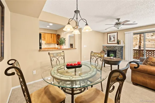 a view of a livingroom with furniture and a table