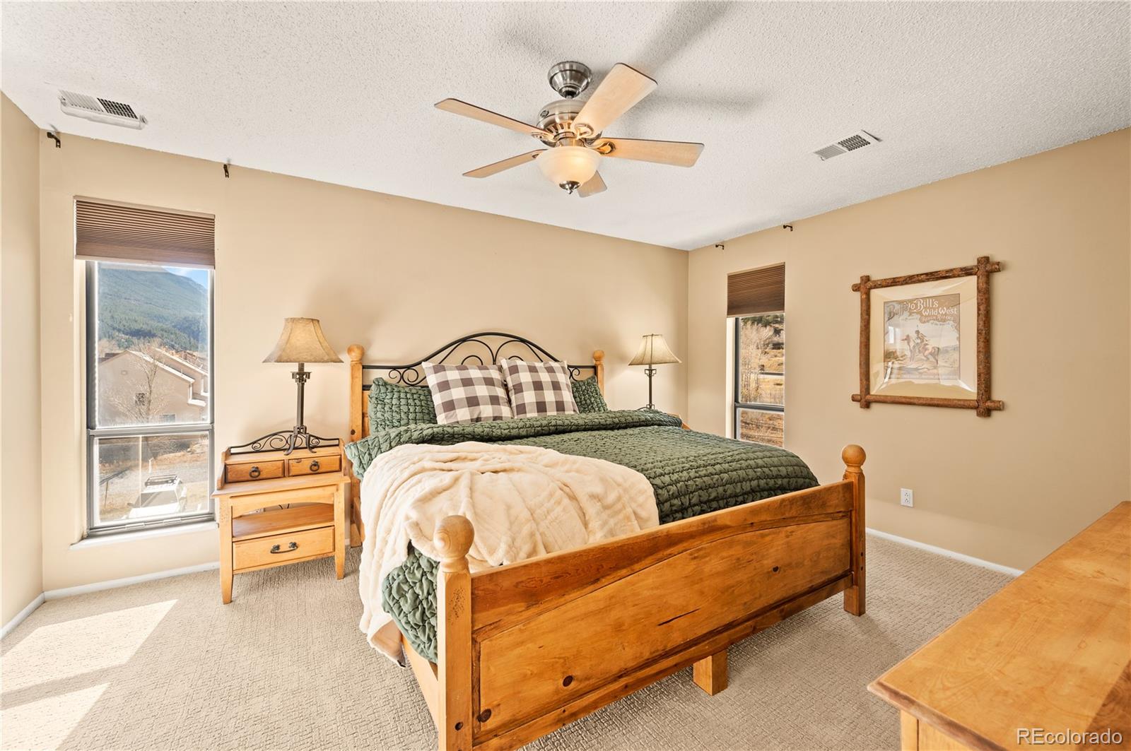 1890 Argentine Street, Unit 303 Georgetown, CO 80444 - Photo 6 of 22 a bedroom with a bed and window