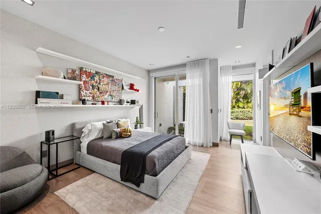 a view of a house with swimming pool and sitting area