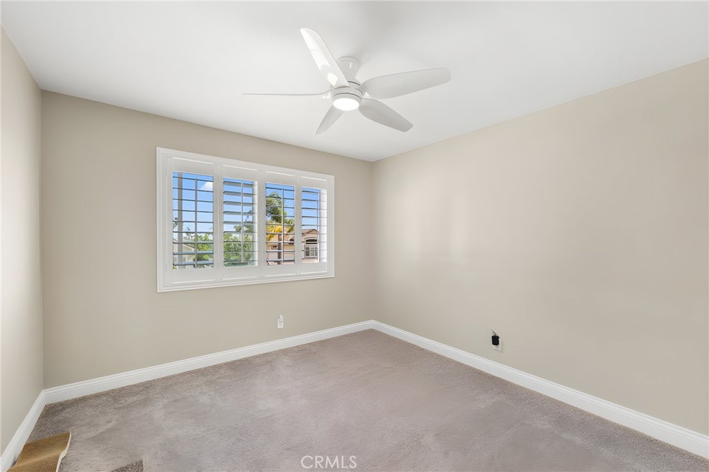 28561 Camelback Road Trabuco Canyon, CA 92679 - Photo 52 of 66 an empty room with a window and a fan