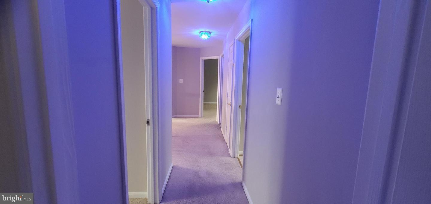 12969 Queen Chapel Road Woodbridge, VA 22193 - Photo 11 of 15 a view of a hallway with closet