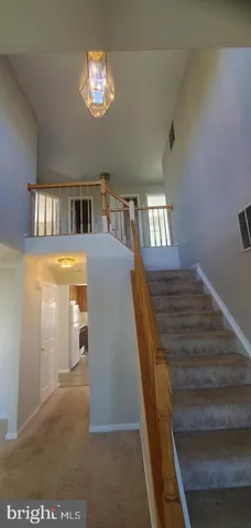 a view of a balcony with furniture