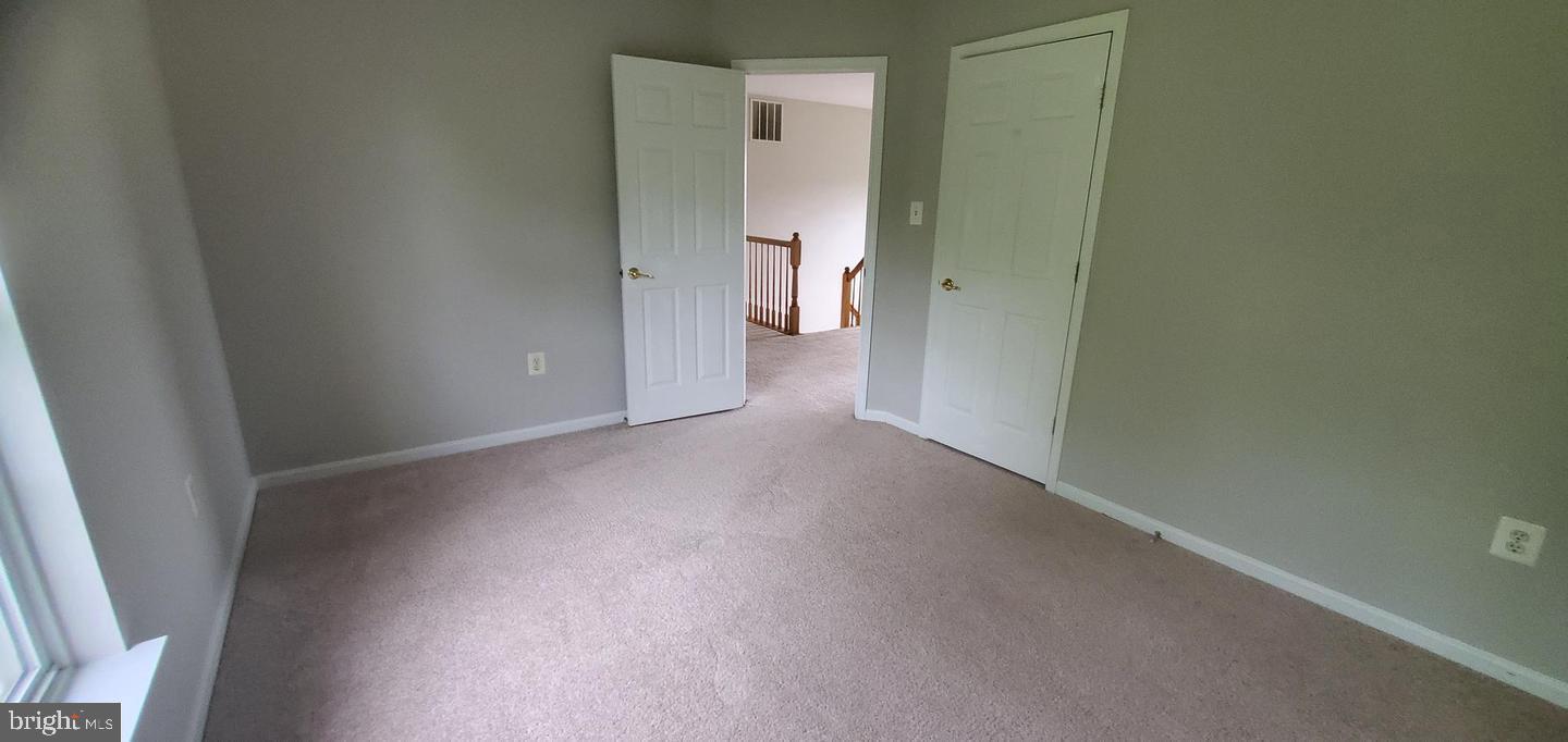 12969 Queen Chapel Road Woodbridge, VA 22193 - Photo 6 of 15 a view of an empty room and a bathroom