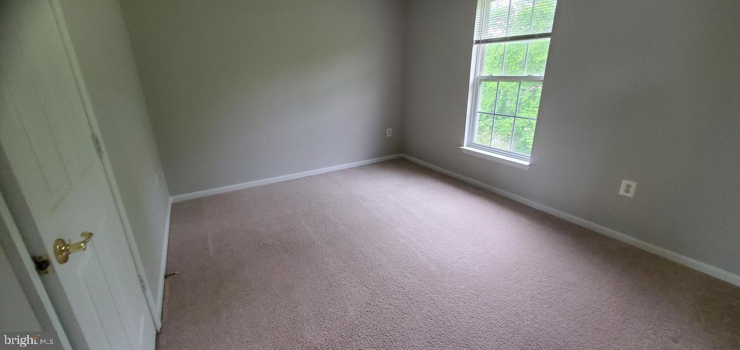 12969 Queen Chapel Road Woodbridge, VA 22193 - Photo 7 of 15 an empty room with a window