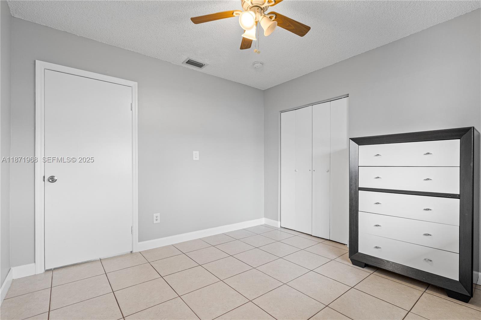 11740 Southwest 182nd Terrace Miami, FL 33177 - Photo 21 of 44 a view of a livingroom with cabinet