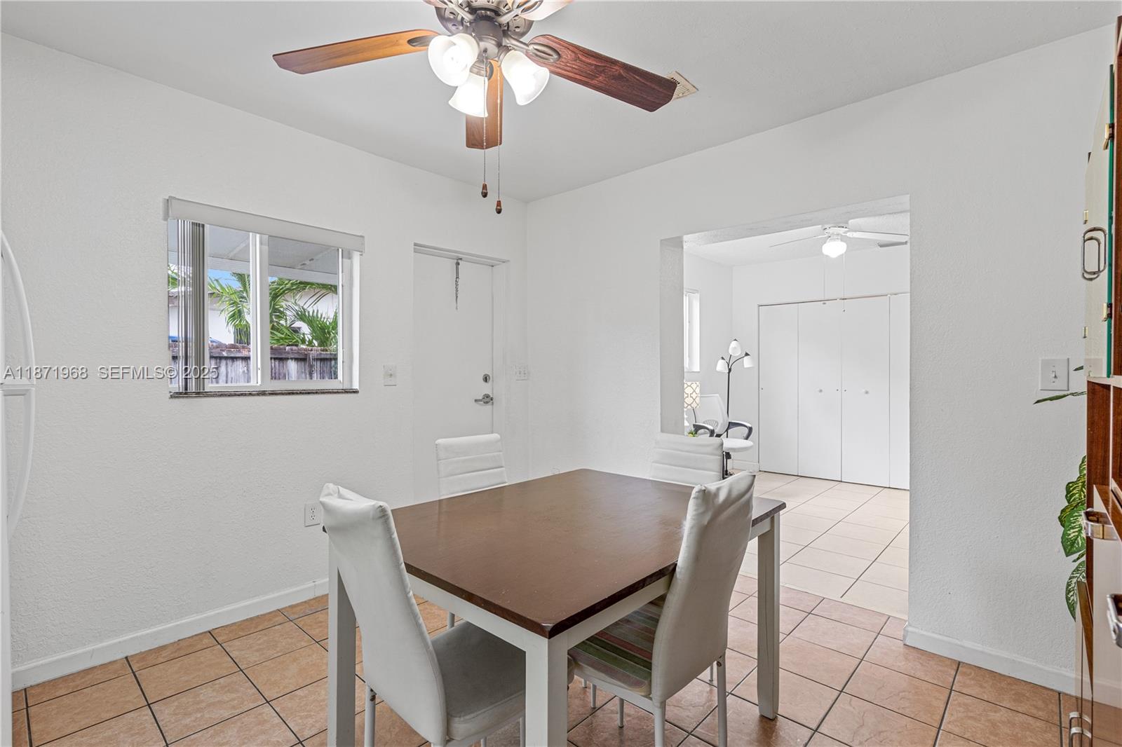 11740 Southwest 182nd Terrace Miami, FL 33177 - Photo 31 of 44 a view of a dining room with furniture