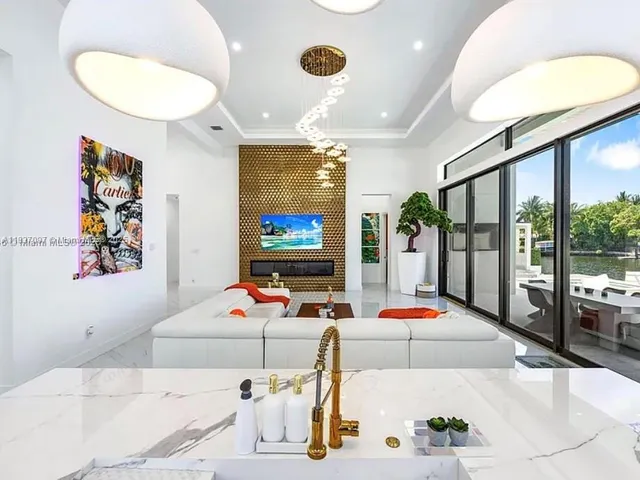 a living room with a bed and a table