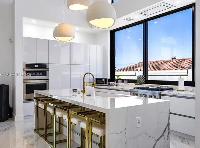 a bathroom with a shower and a sink