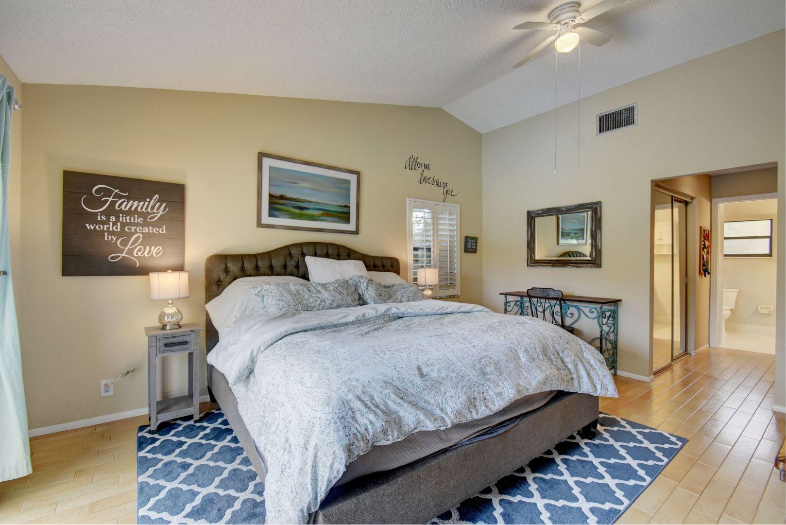 9525 Denver Court Boca Raton, FL 33434 - Photo 14 of 26 a bedroom with bed and a window