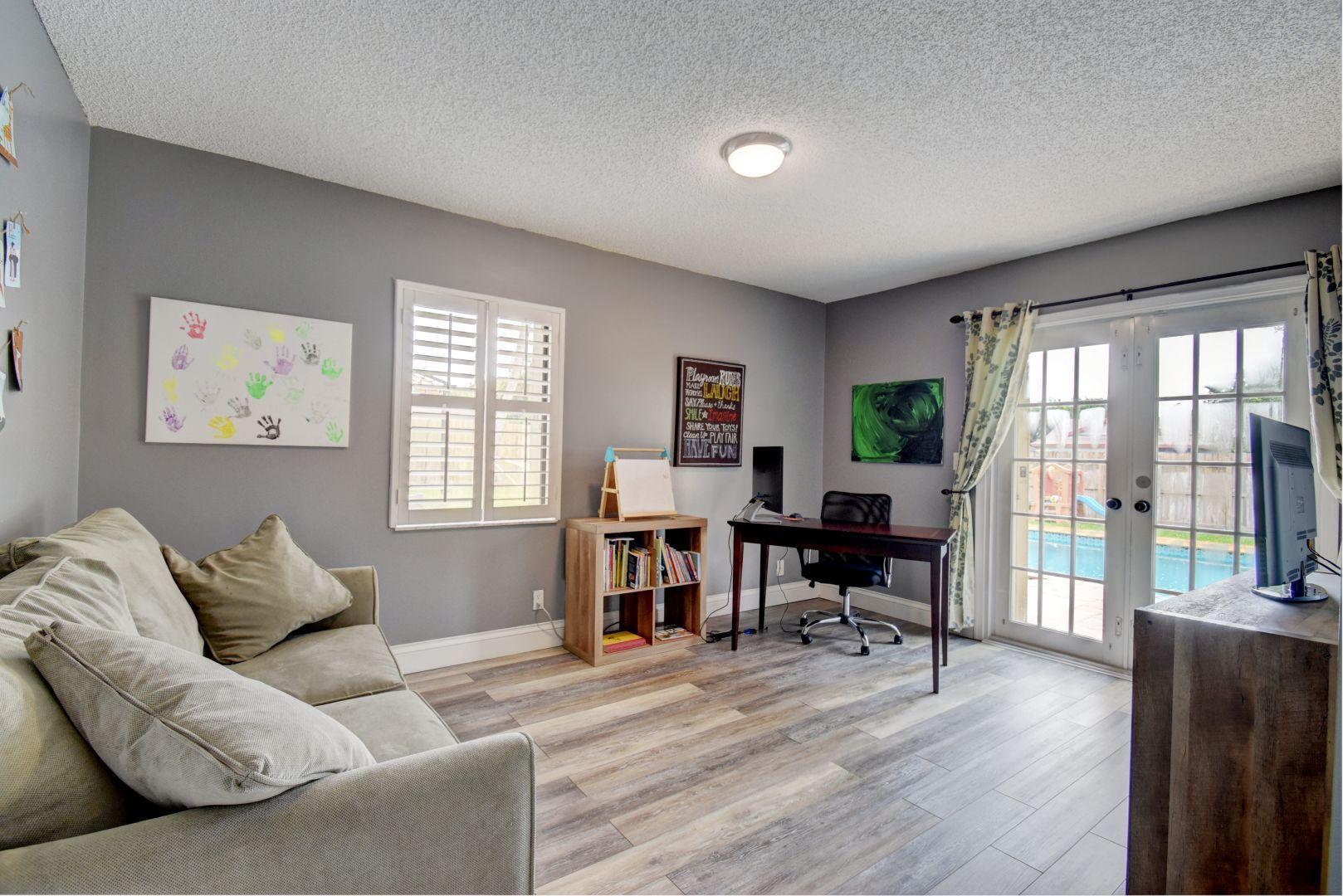 9525 Denver Court Boca Raton, FL 33434 - Photo 18 of 26 a living room with furniture and a wooden floor