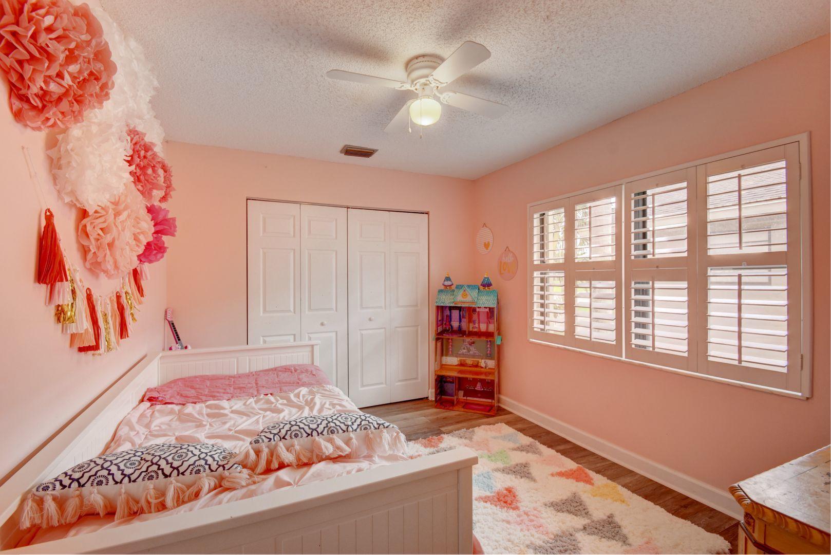 9525 Denver Court Boca Raton, FL 33434 - Photo 20 of 26 a bedroom with a bed and a window