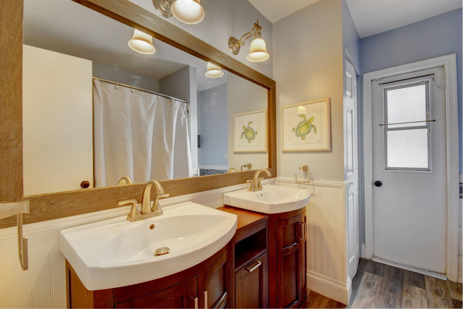9525 Denver Court Boca Raton, FL 33434 - Photo 21 of 26 a bathroom with a sink and a mirror
