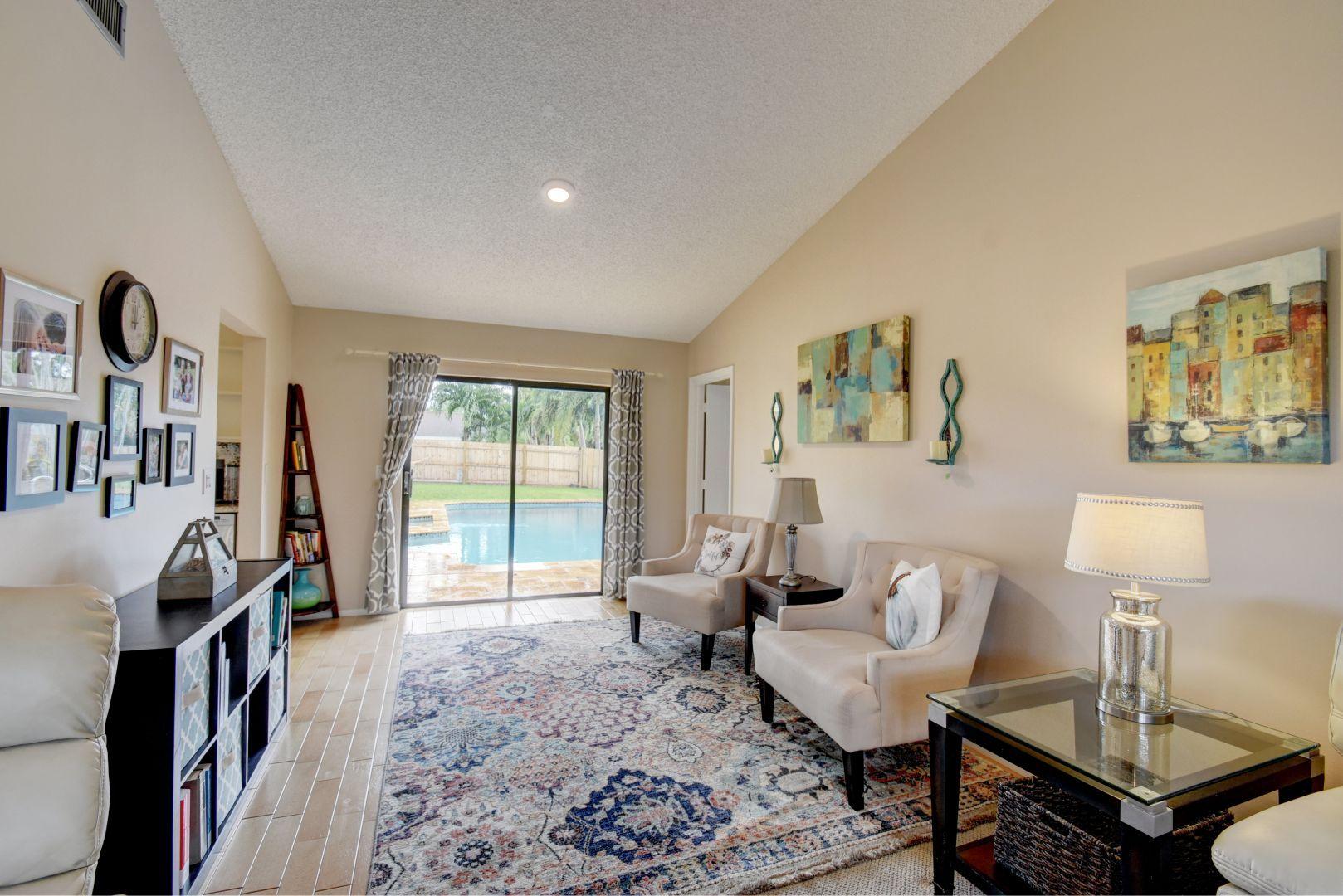 9525 Denver Court Boca Raton, FL 33434 - Photo 6 of 26 a living room with furniture and a window