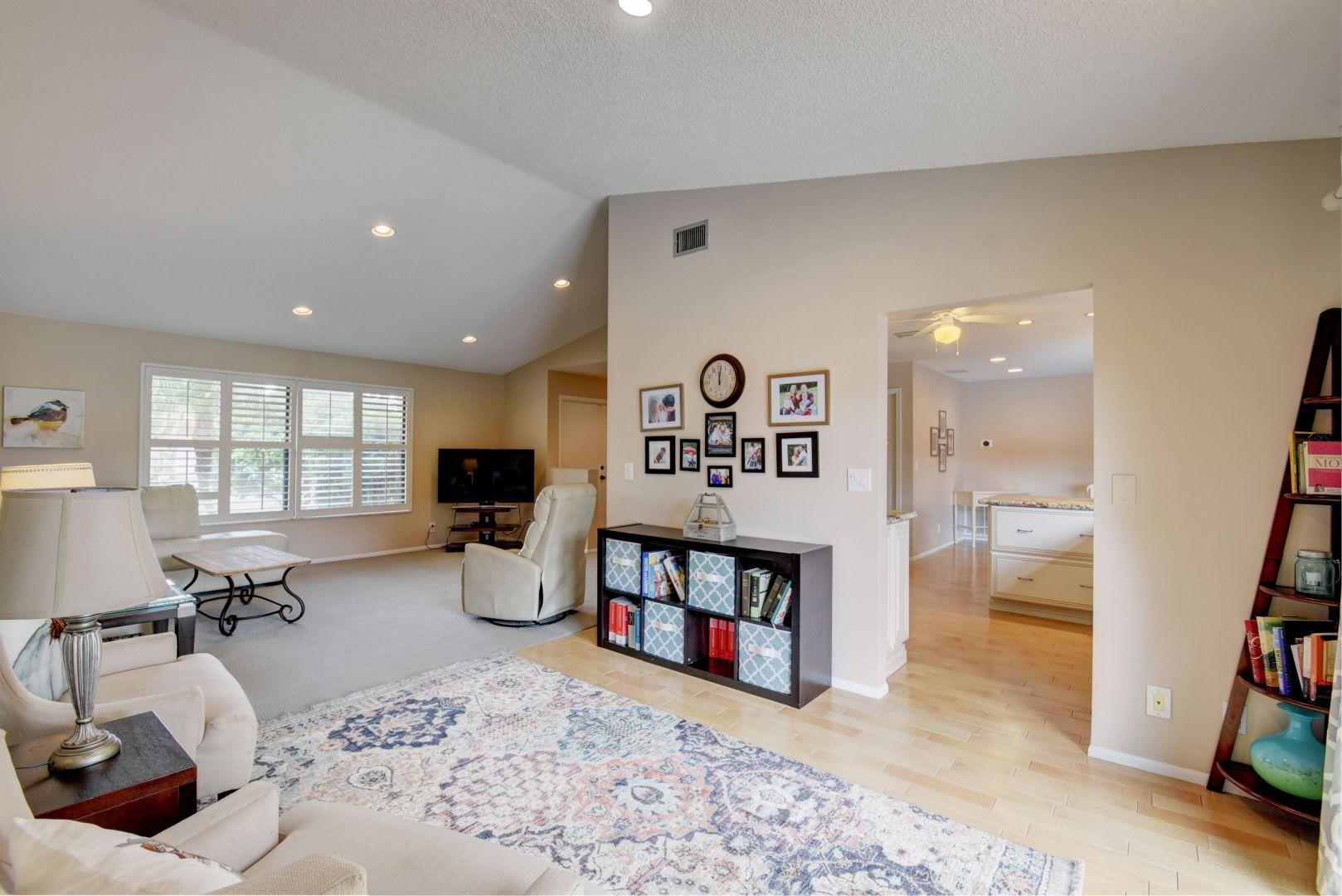 9525 Denver Court Boca Raton, FL 33434 - Photo 7 of 26 a living room with furniture and a flat screen tv