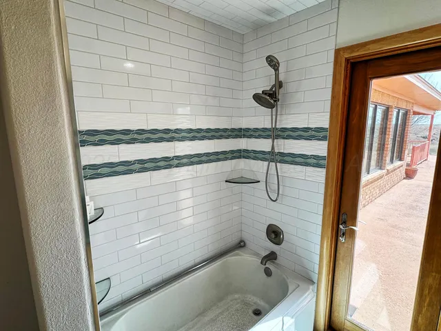 a bathroom with a bathtub