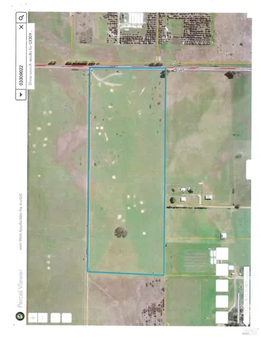 a bathroom with a glass shower door and a sink