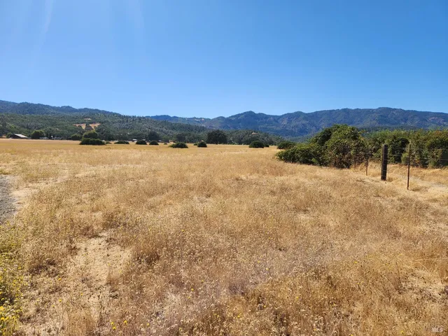 a view of lake and mountain