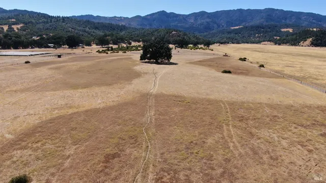 a view of a road with a snow on the road