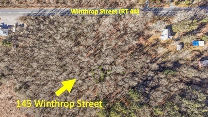 145 Winthrop Street Rehoboth, MA 02769 - Photo 3 of 8 a view of a street with a building in the background