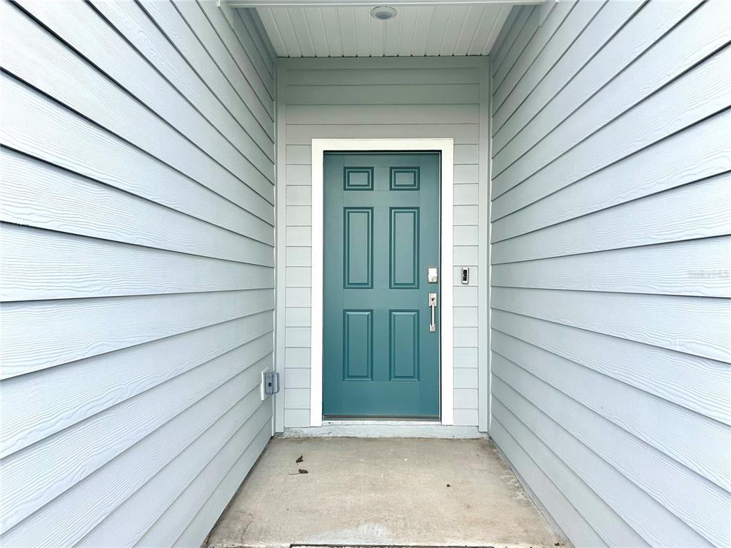 1103 Northwest 44th Court Road Ocala, FL 34482 - Photo 5 of 36 a view of front door