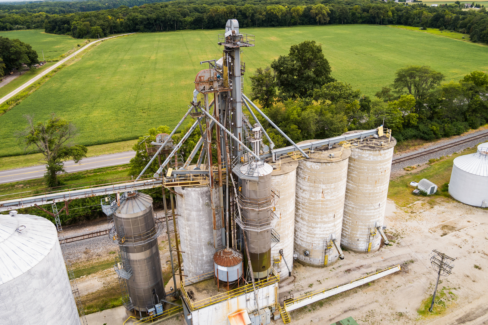 8400 Birkbeck Road Clinton, IL 61727 - Photo 17 of 22 a view of a lake with a floor to ceiling window next to a yard