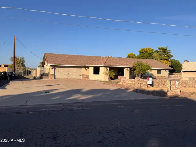 a front view of a house with yard