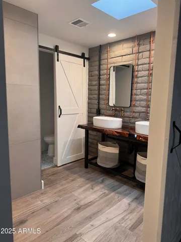 a room with furniture and a flat screen tv